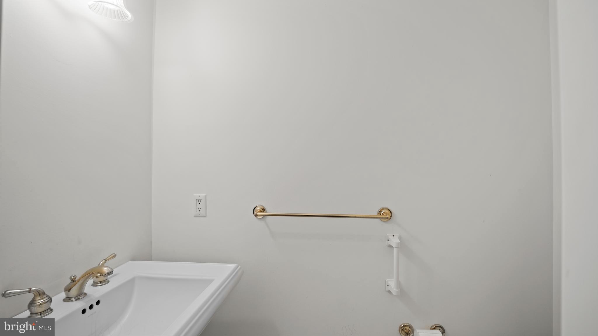 8 Bethpage Drive Skillman, NJ 08558 - Photo 21 of 36 a bathroom with a sink and mirror