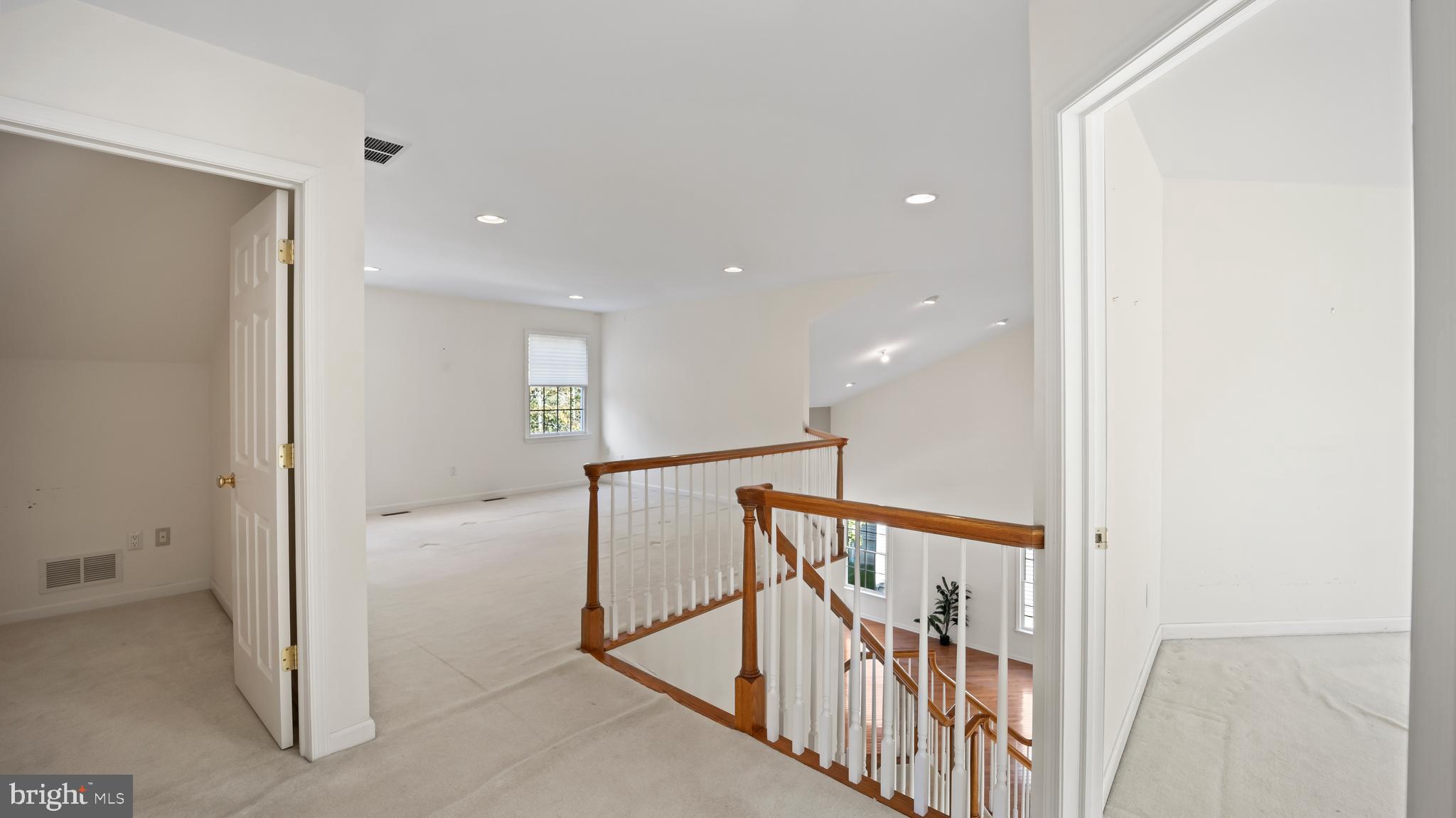 8 Bethpage Drive Skillman, NJ 08558 - Photo 24 of 36 a view of a hallway with staircase