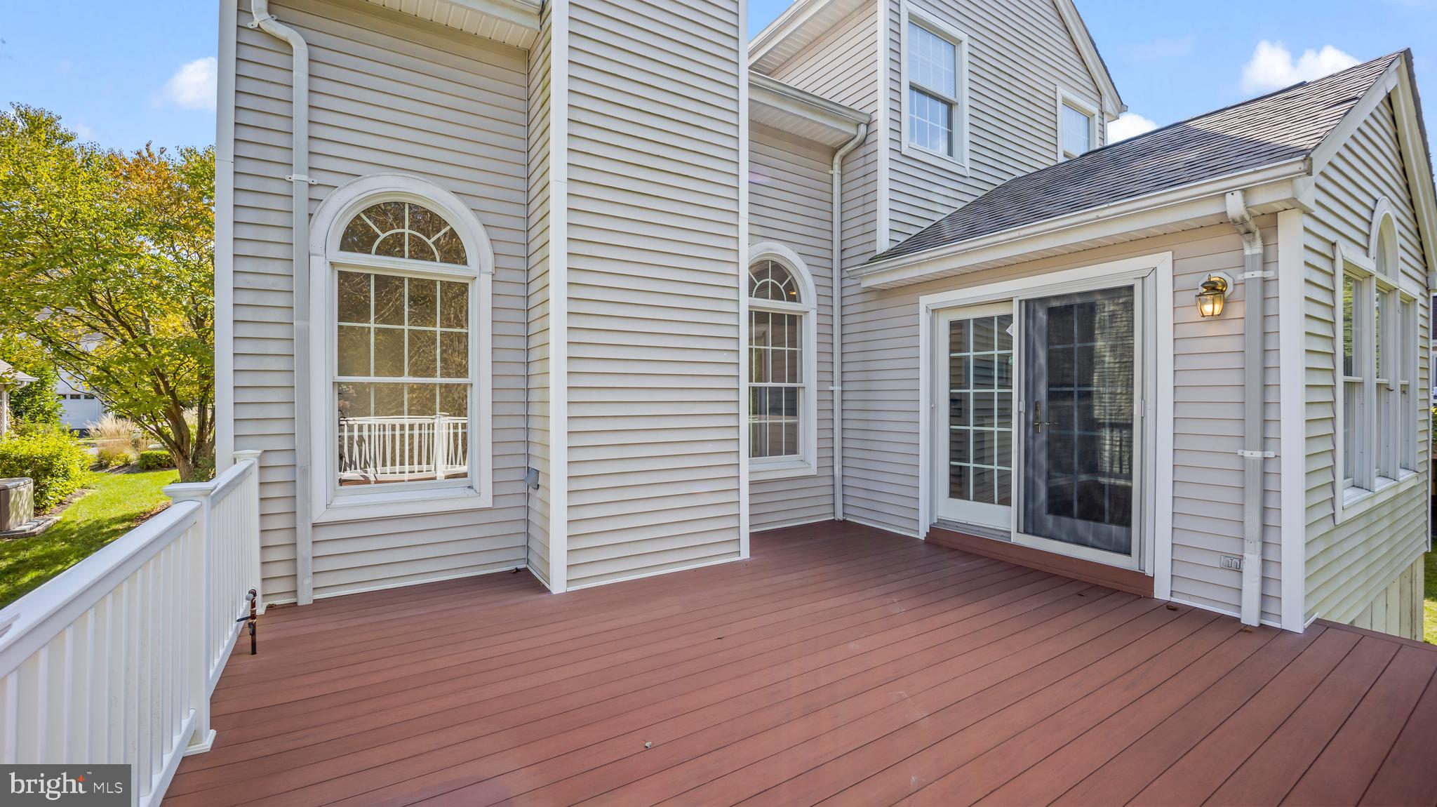 8 Bethpage Drive Skillman, NJ 08558 - Photo 33 of 36 a view of a house with a deck
