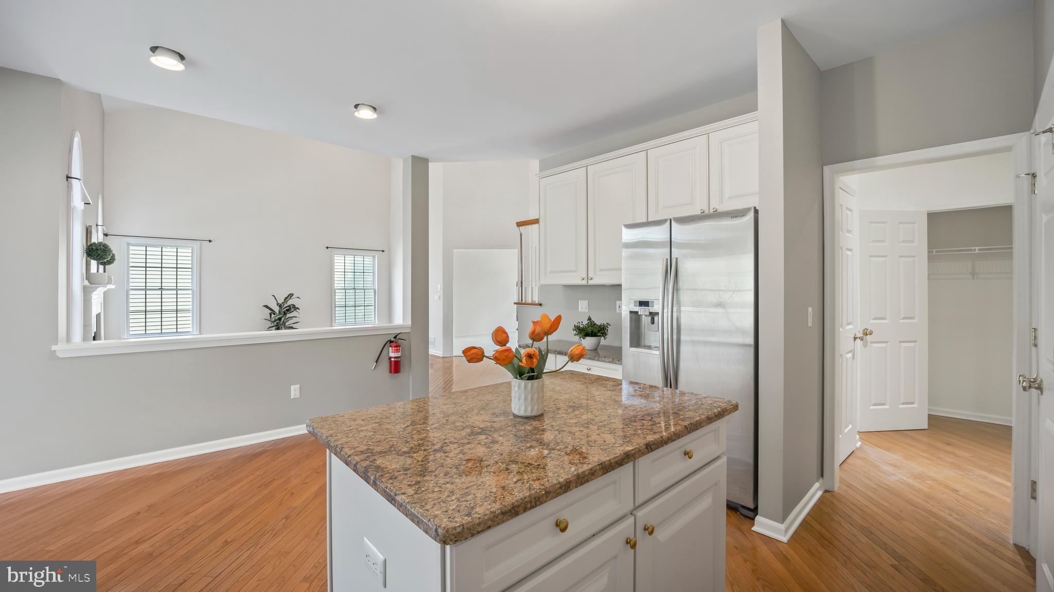8 Bethpage Drive Skillman, NJ 08558 - Photo 8 of 36 a kitchen with stainless steel appliances granite countertop a refrigerator and a sink