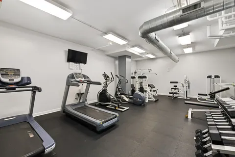 a view of a room with gym equipment