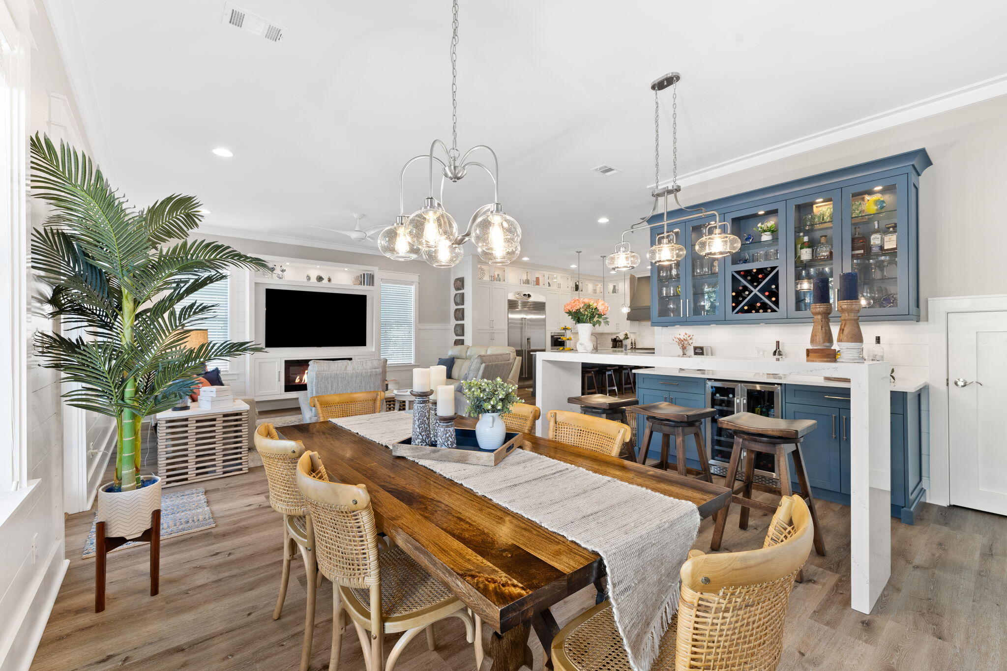 101 Santa Clara Street Santa Rosa Beach, FL 32459 - Photo 26 of 112 a view of a dining room and livingroom with furniture wooden floor a chandelier