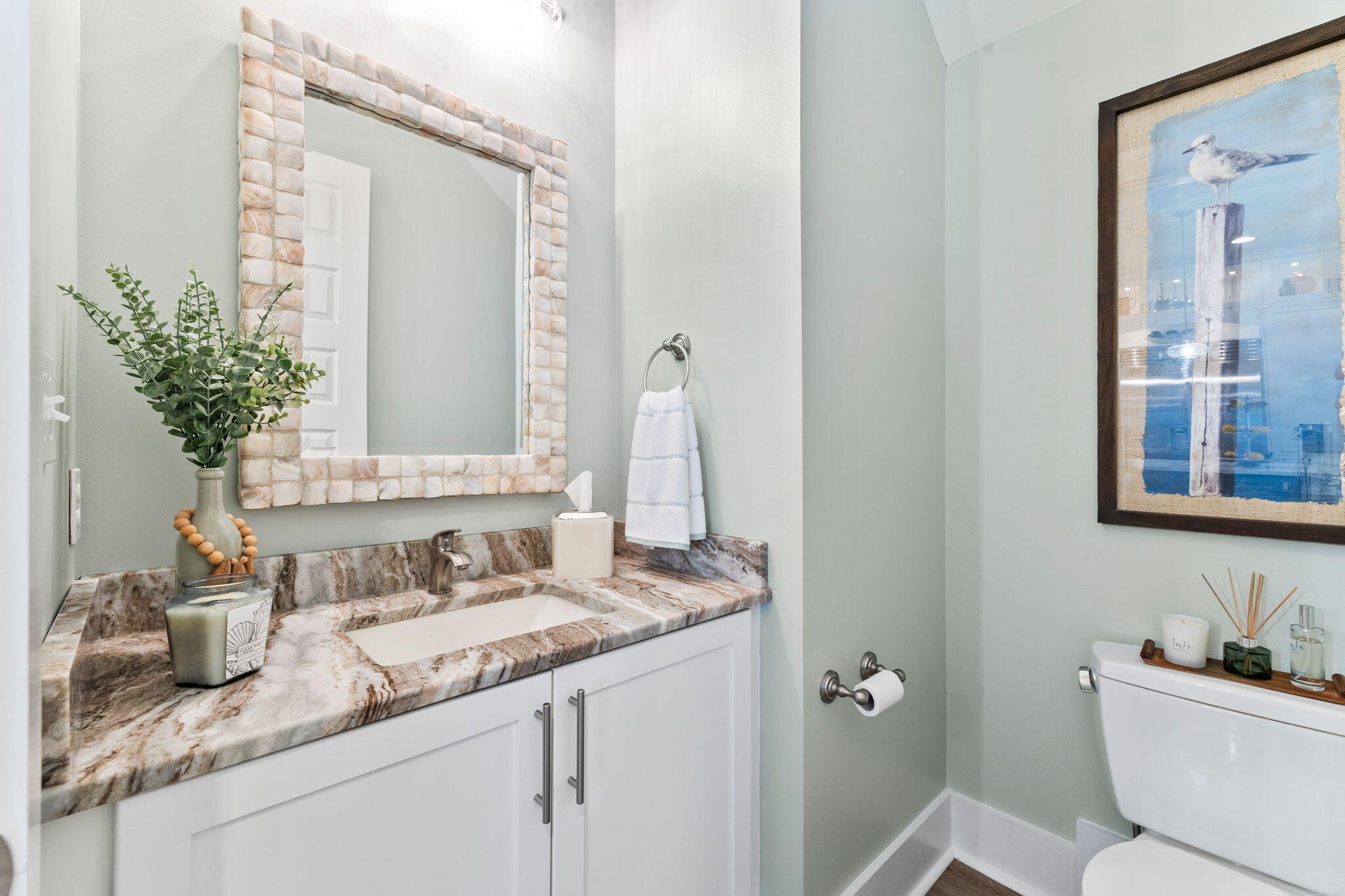 101 Santa Clara Street Santa Rosa Beach, FL 32459 - Photo 34 of 112 a bathroom with a granite countertop sink a toilet and a mirror