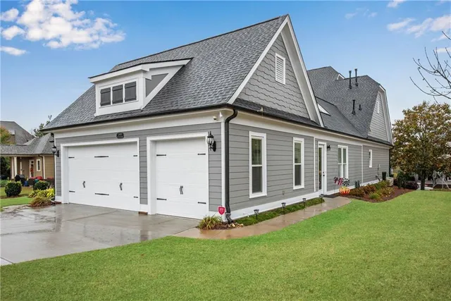 a picture of a room with a white wall and white cabinet