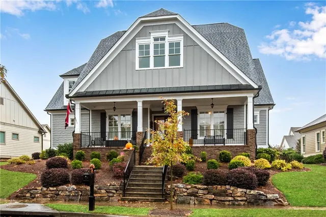 a view of a parked cars in front of house