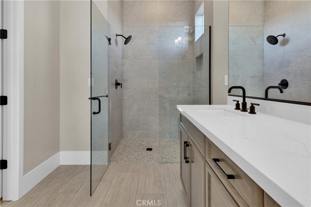 1336 Cava Road Paso Robles, CA 93446 - Photo 12 of 16 a bathroom with a sink and a mirror