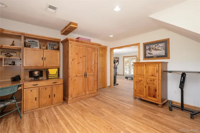 a view of a kitchen with electric appliances