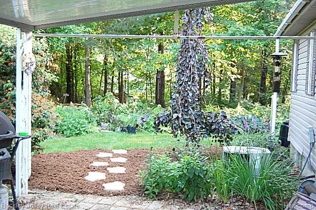 1900 Brewer Road Howell, MI 48855 - Photo 10 of 17 Mature Landscaping
