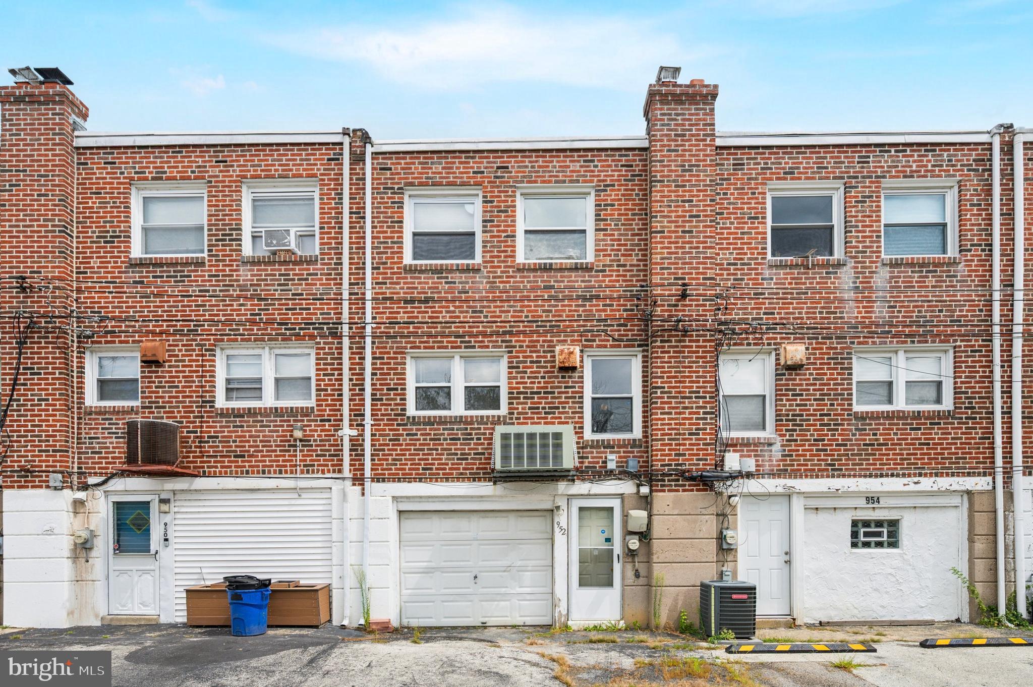 952 Grant Road Folcroft, PA 19032 - Photo 19 of 19 a front view of a building with street