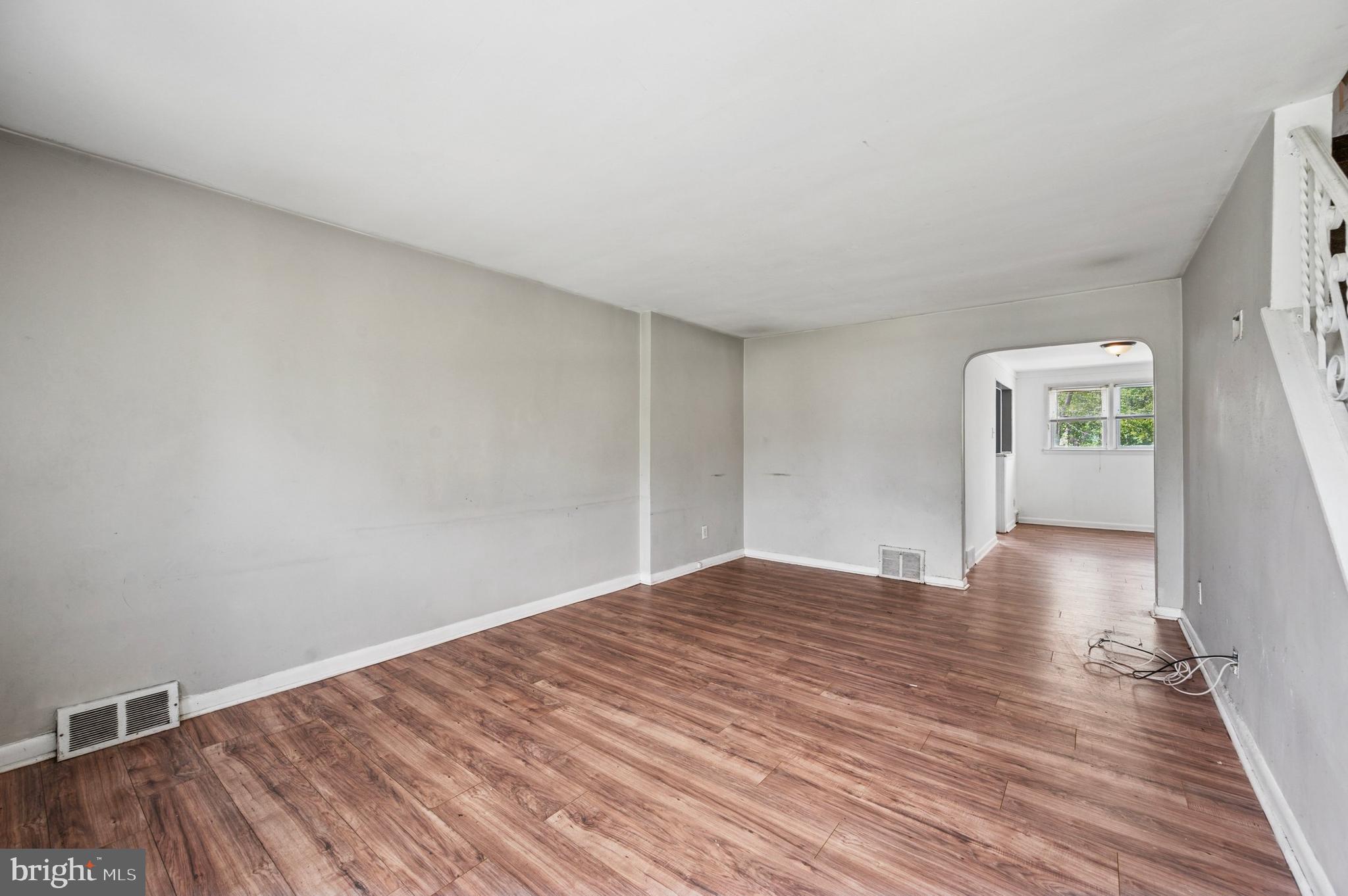 952 Grant Road Folcroft, PA 19032 - Photo 4 of 19 a view of empty room with wooden floor