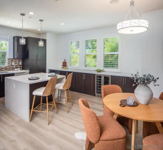 a view of a dining room with furniture window and outside view