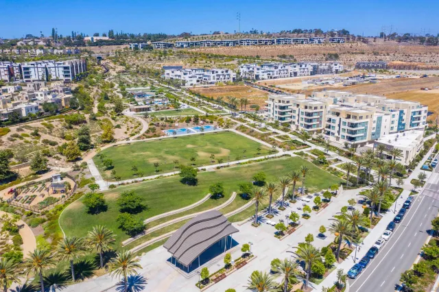 an aerial view of residential building and lake view