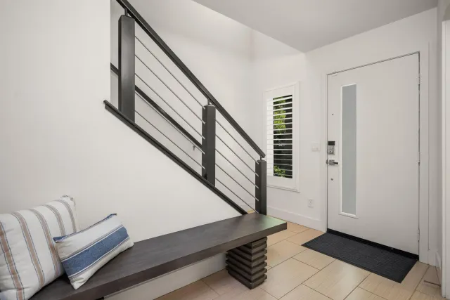 a view of hallway with furniture