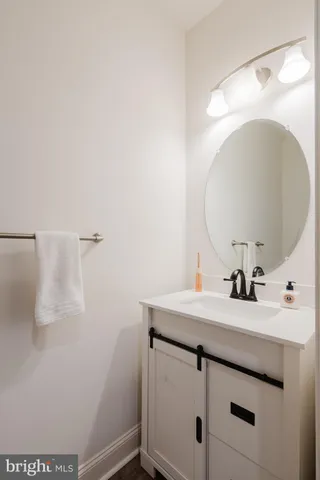 a utility room with sink dryer and washer