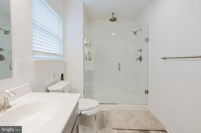 a bedroom with a bed and a table in it