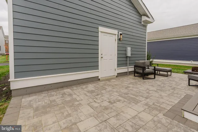 a view of a backyard of the house