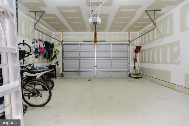 aerial view of a house with a yard