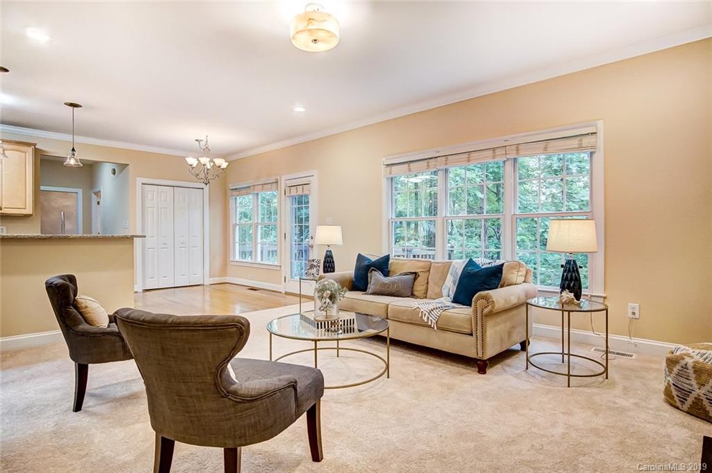 11121 Windgate Court Tega Cay, SC 29708 - Photo 11 of 44 a living room with furniture and a large window