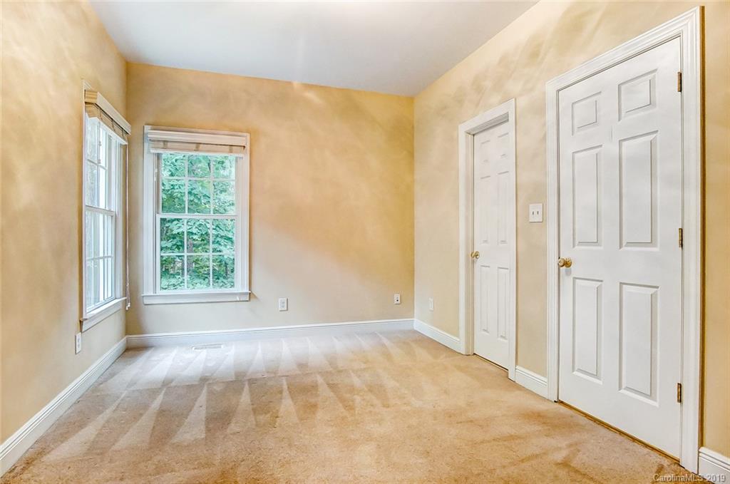 11121 Windgate Court Tega Cay, SC 29708 - Photo 26 of 44 a view of an empty room with a window