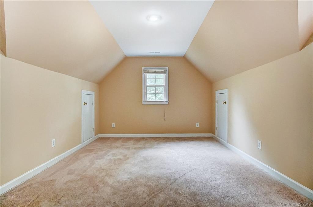 11121 Windgate Court Tega Cay, SC 29708 - Photo 38 of 44 an empty room with a window