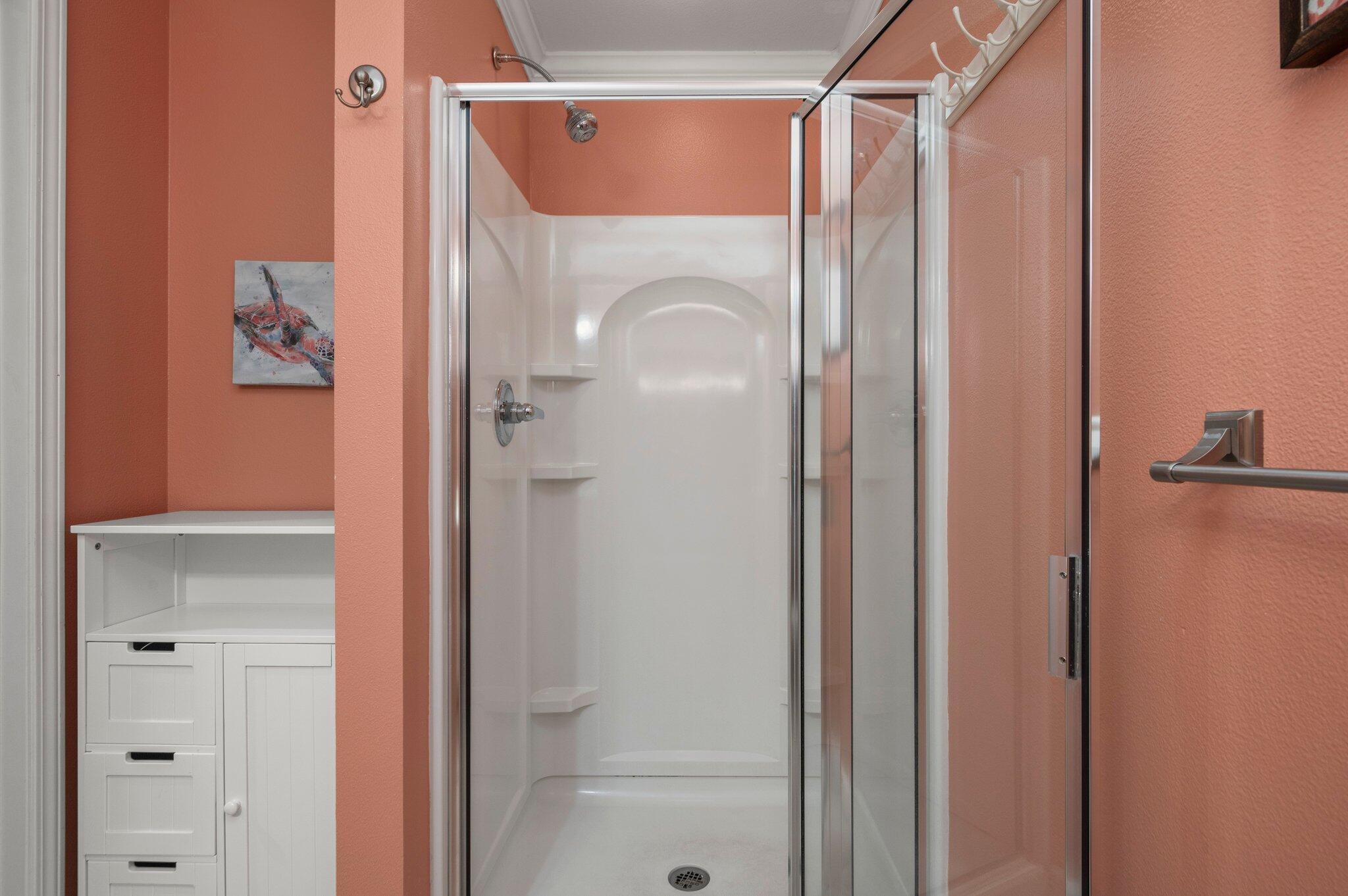 548 Sandy Cay Drive, Unit 203 Miramar Beach, FL 32550 - Photo 17 of 48 a bathroom that has a glass shower door