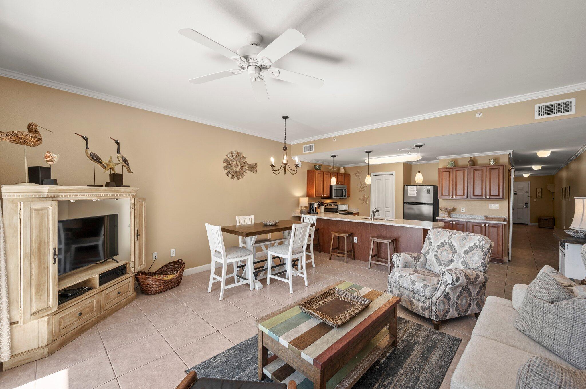 548 Sandy Cay Drive, Unit 203 Miramar Beach, FL 32550 - Photo 20 of 48 a living room with furniture and a fireplace