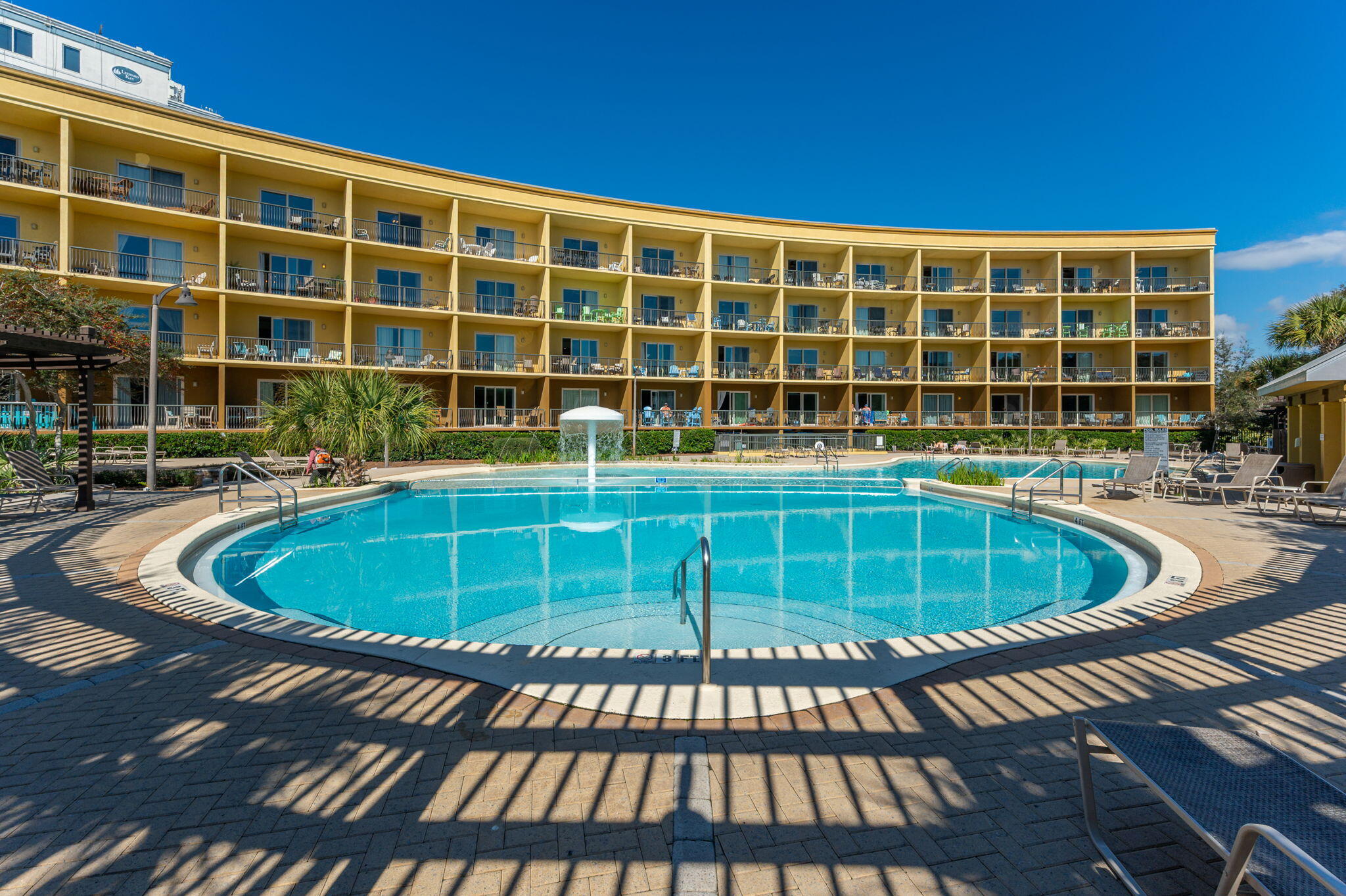 548 Sandy Cay Drive, Unit 203 Miramar Beach, FL 32550 - Photo 2 of 48 a view of a swimming pool with a chairs