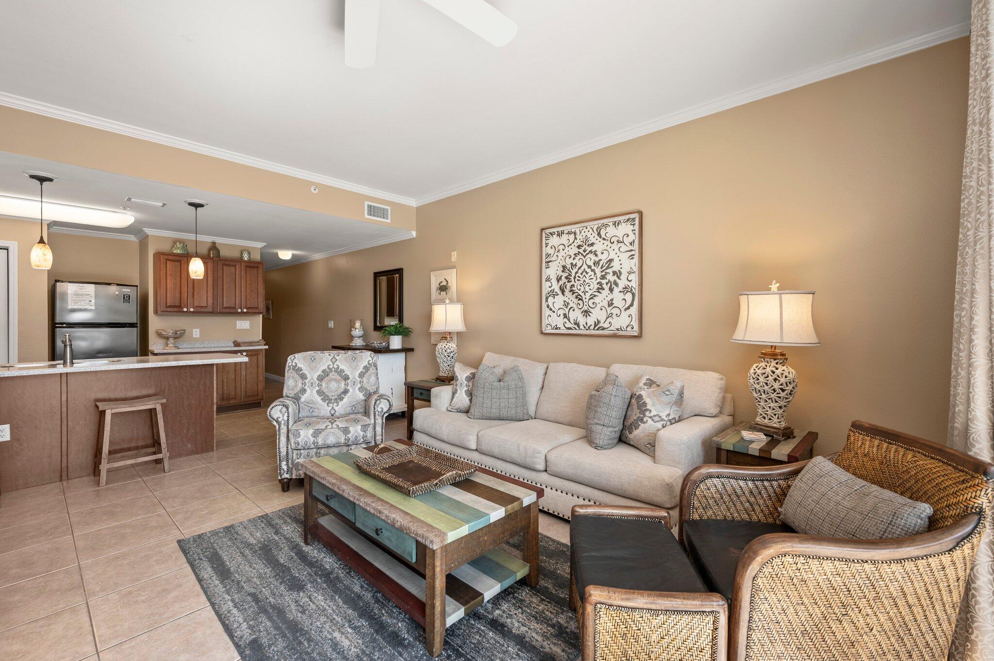 548 Sandy Cay Drive, Unit 203 Miramar Beach, FL 32550 - Photo 23 of 48 a living room with furniture and a table