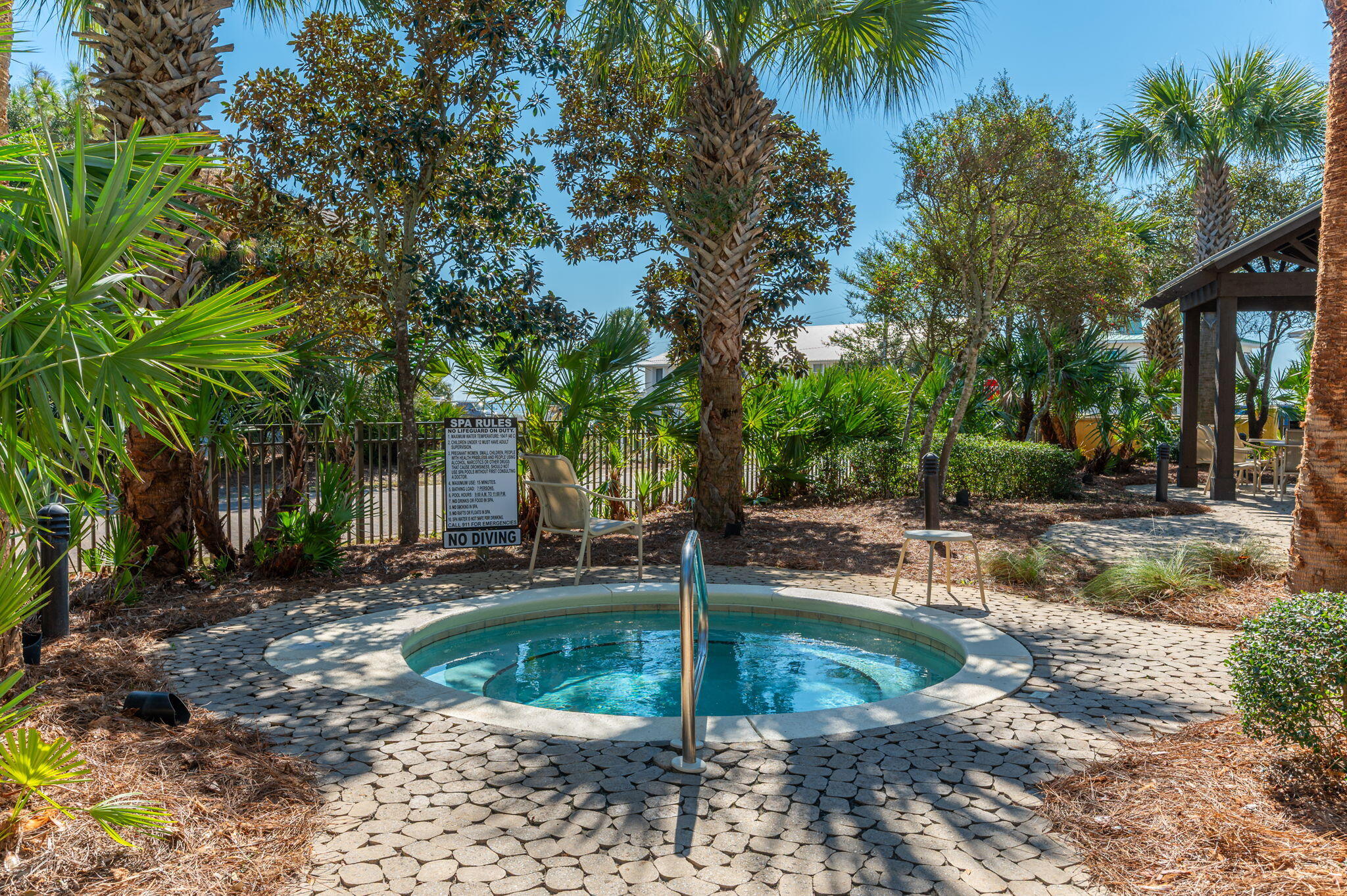 548 Sandy Cay Drive, Unit 203 Miramar Beach, FL 32550 - Photo 27 of 48 a view of a water fountain in front of a house