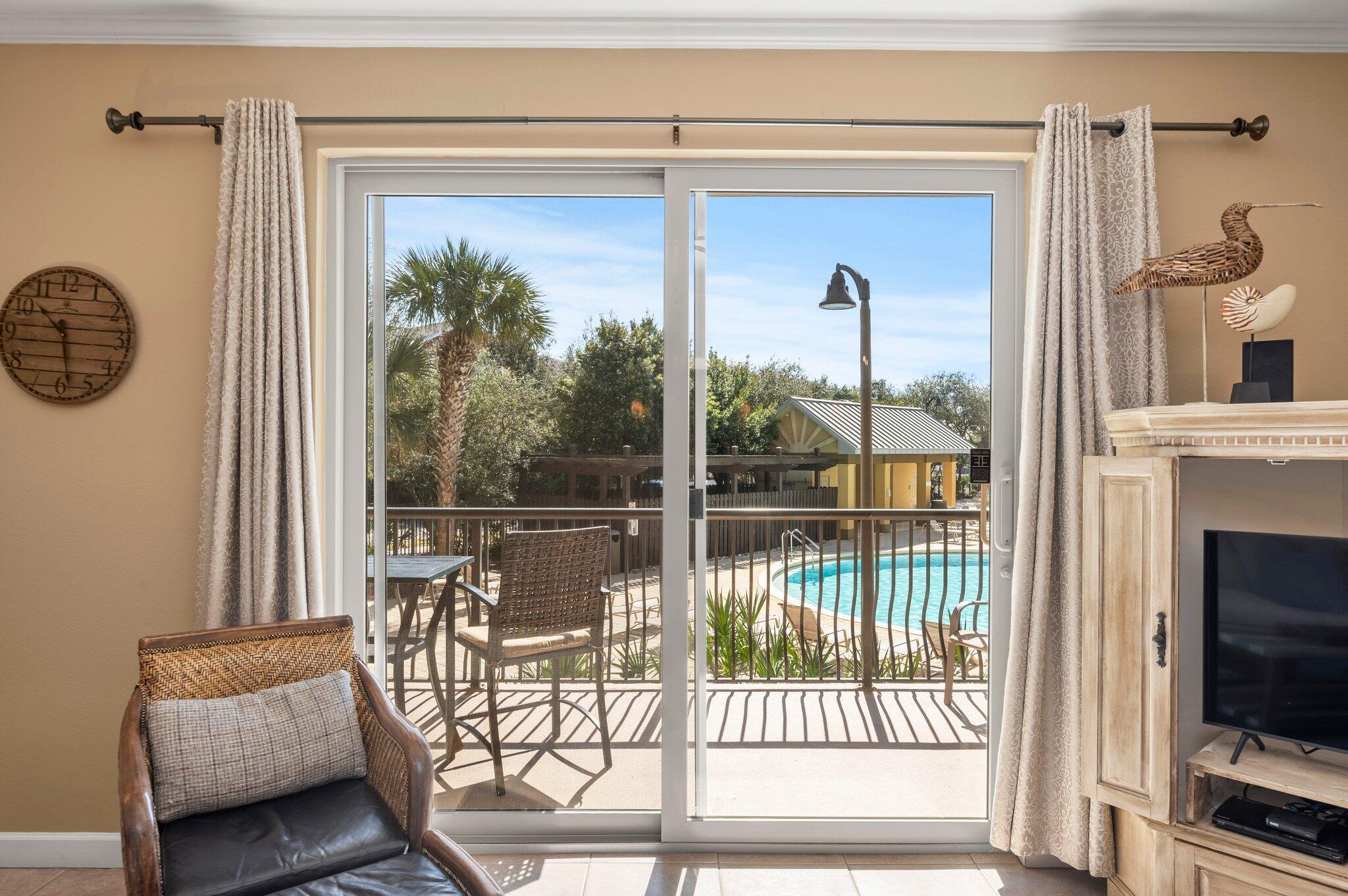 548 Sandy Cay Drive, Unit 203 Miramar Beach, FL 32550 - Photo 3 of 48 a bedroom with furniture and a window