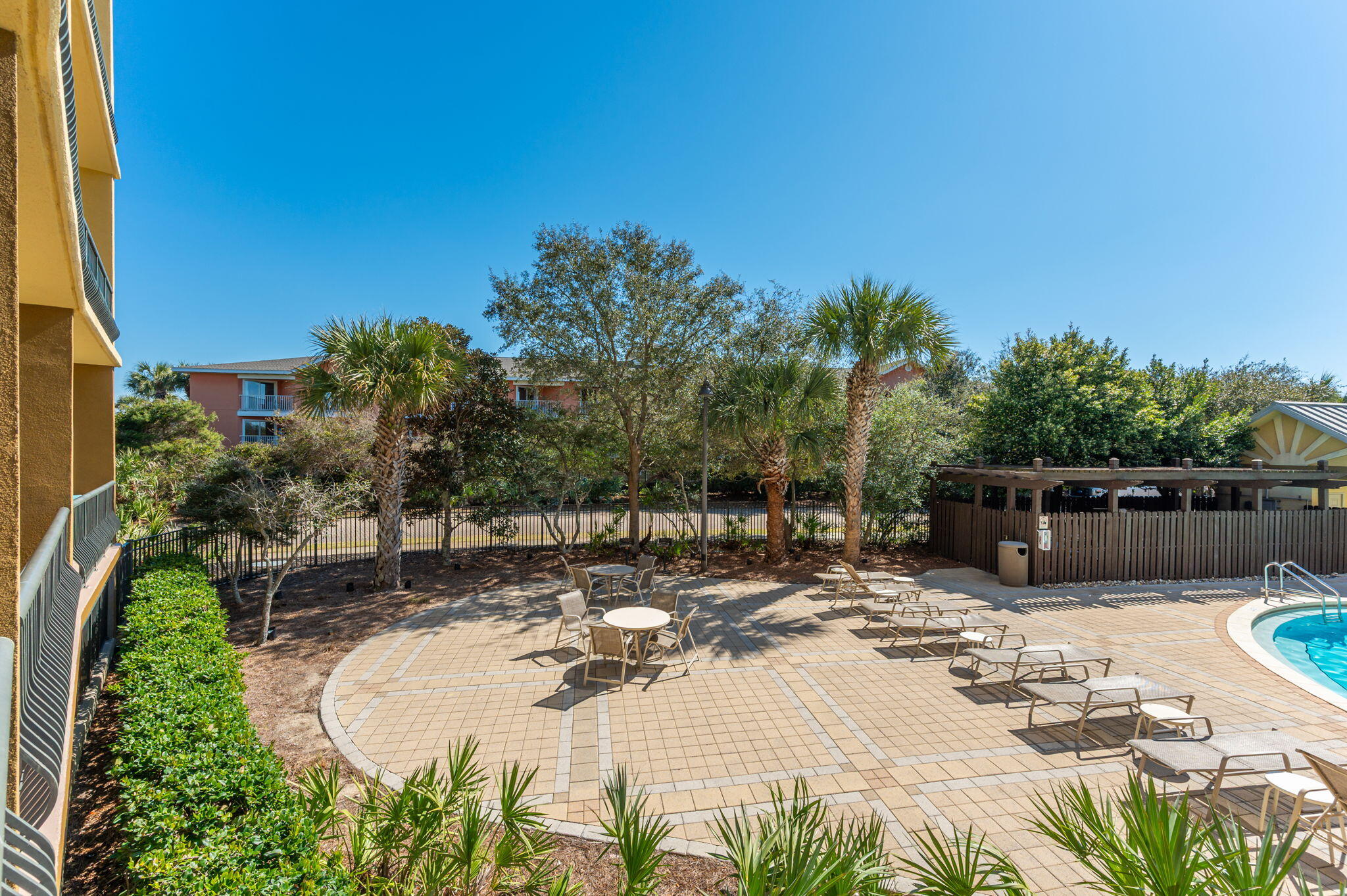 548 Sandy Cay Drive, Unit 203 Miramar Beach, FL 32550 - Photo 39 of 48 a view of a backyard with sitting area
