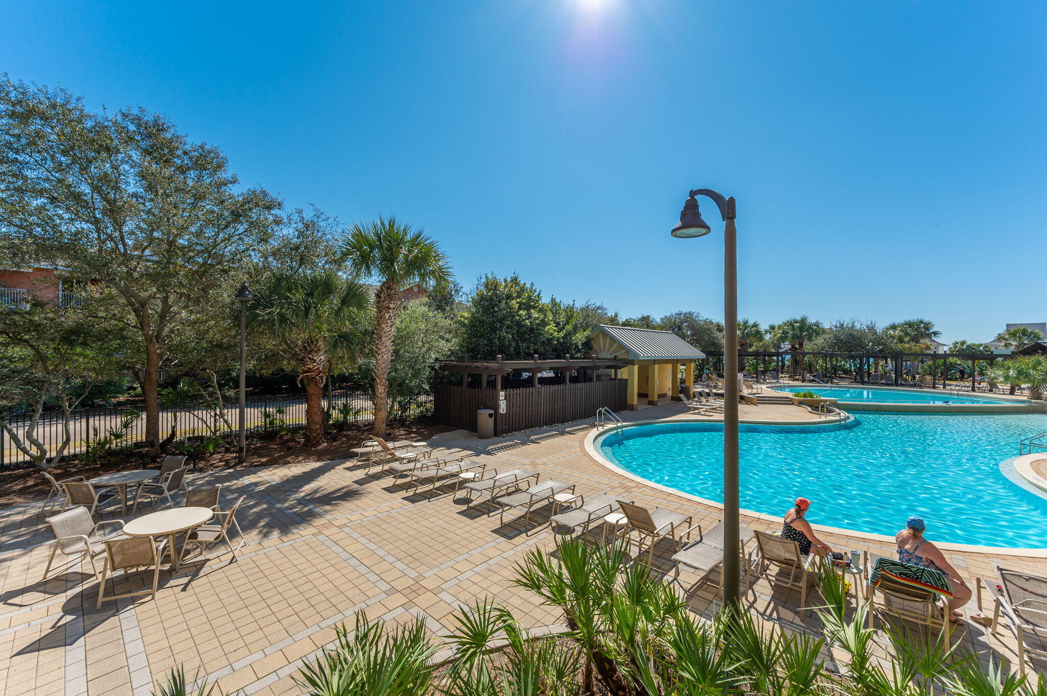 548 Sandy Cay Drive, Unit 203 Miramar Beach, FL 32550 - Photo 40 of 48 a swimming pool with outdoor seating and yard