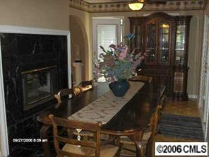 16040 Samoa Court Tega Cay, SC 29708 - Photo 5 of 8 a view of a dining room with furniture