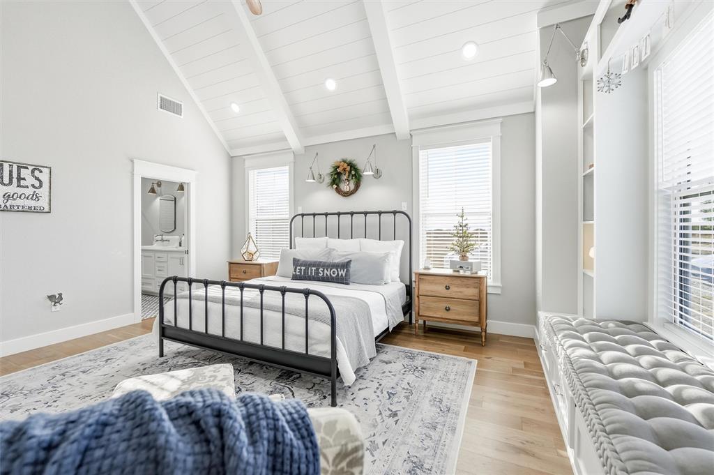 245 La Cresta Lane Perrin, TX 76486 - Photo 15 of 40 a bedroom with a bed and a window