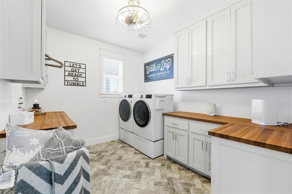 245 La Cresta Lane Perrin, TX 76486 - Photo 27 of 40 a utility room with sink dryer and washer