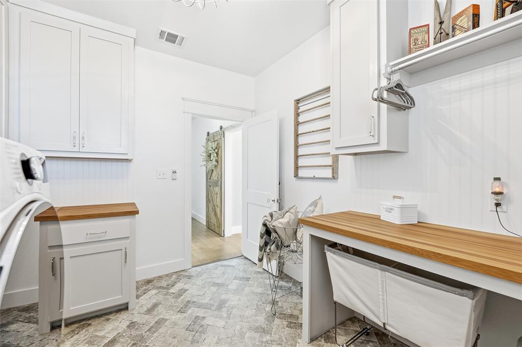 245 La Cresta Lane Perrin, TX 76486 - Photo 28 of 40 a room with storage and utility