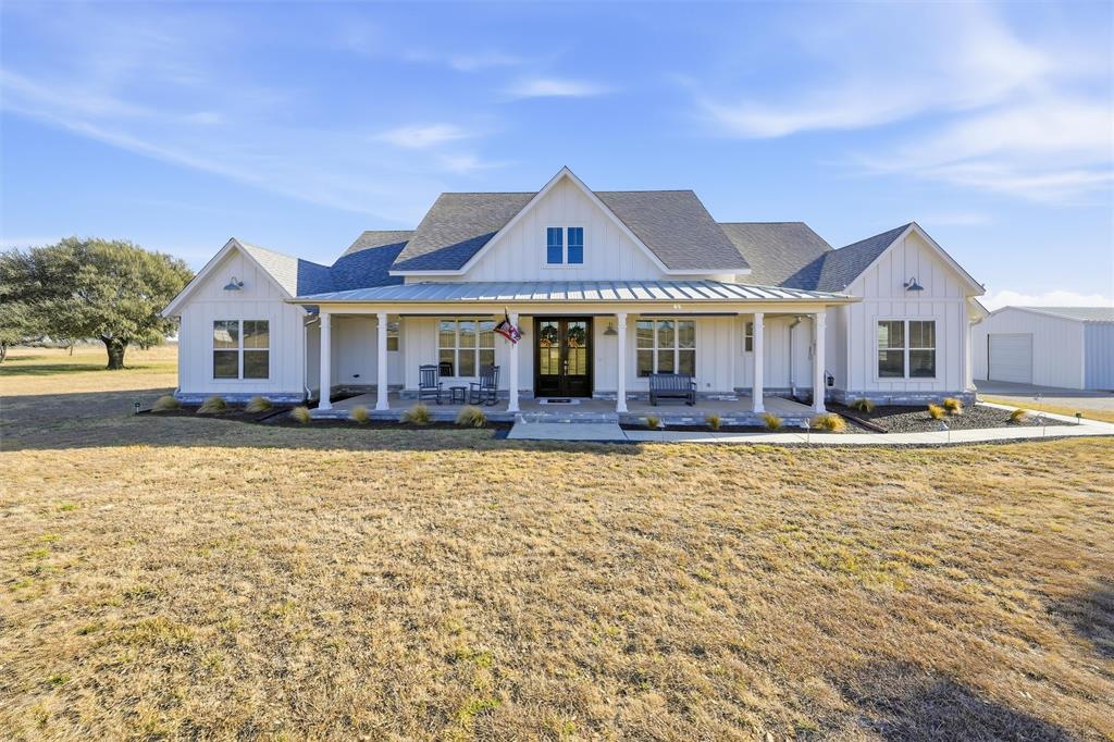 245 La Cresta Lane Perrin, TX 76486 - Photo 34 of 40 a front view of a house with swimming pool