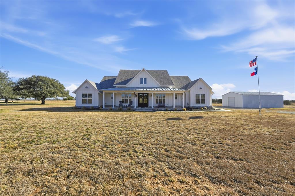 245 La Cresta Lane Perrin, TX 76486 - Photo 35 of 39 a front view of a house with a yard