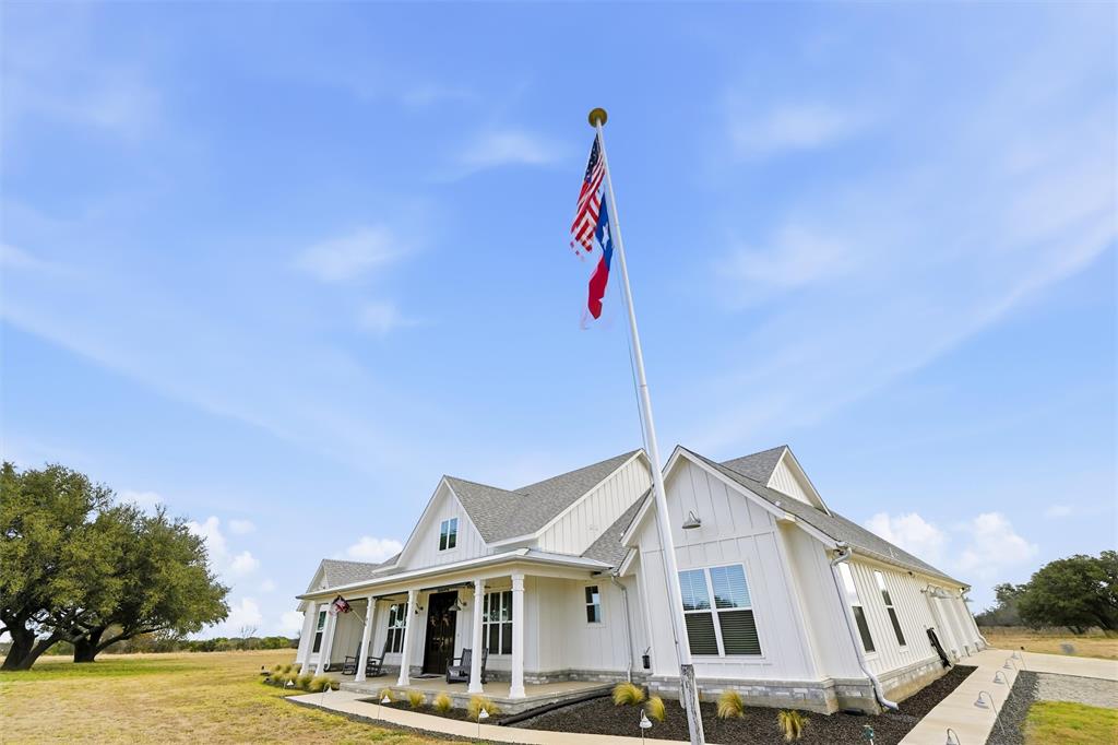245 La Cresta Lane Perrin, TX 76486 - Photo 35 of 40 a front view of a house with a ocean