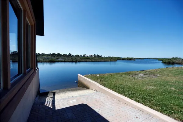 a view of a lake with a outdoor space