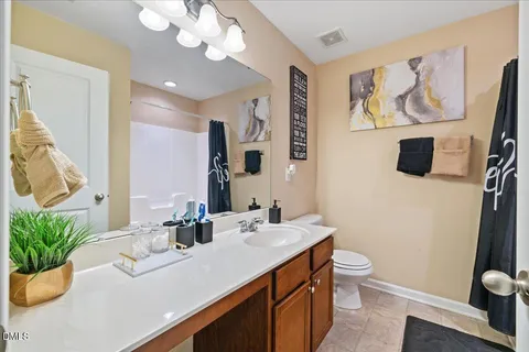 a view of backyard with outdoor seating