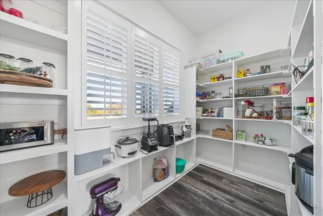 a room with storage and utility