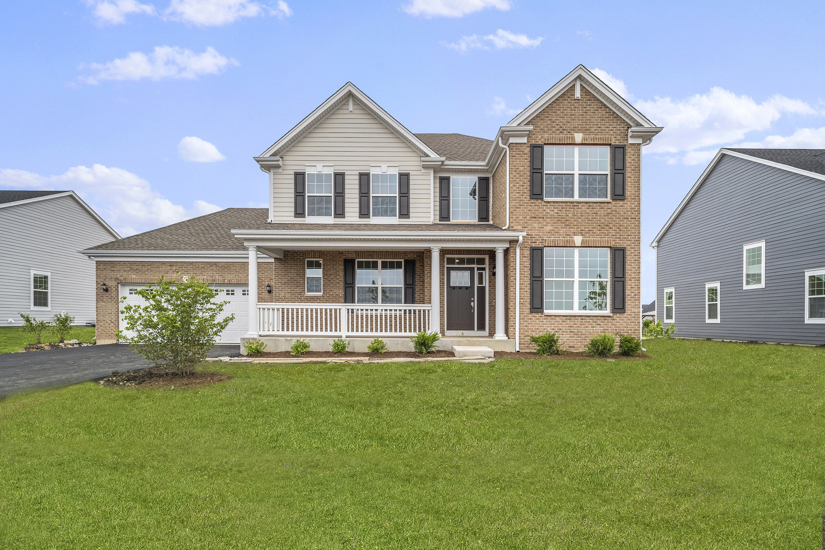 3668 Edelweiss Road Elgin, IL 60124 - Photo 1 of 23 a front view of a house with a yard