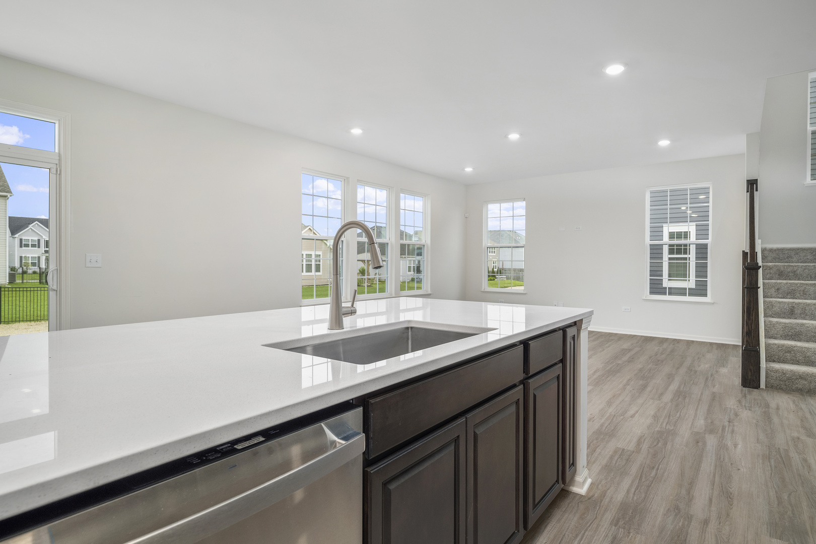 3668 Edelweiss Road Elgin, IL 60124 - Photo 11 of 23 a kitchen with a sink and wooden floor