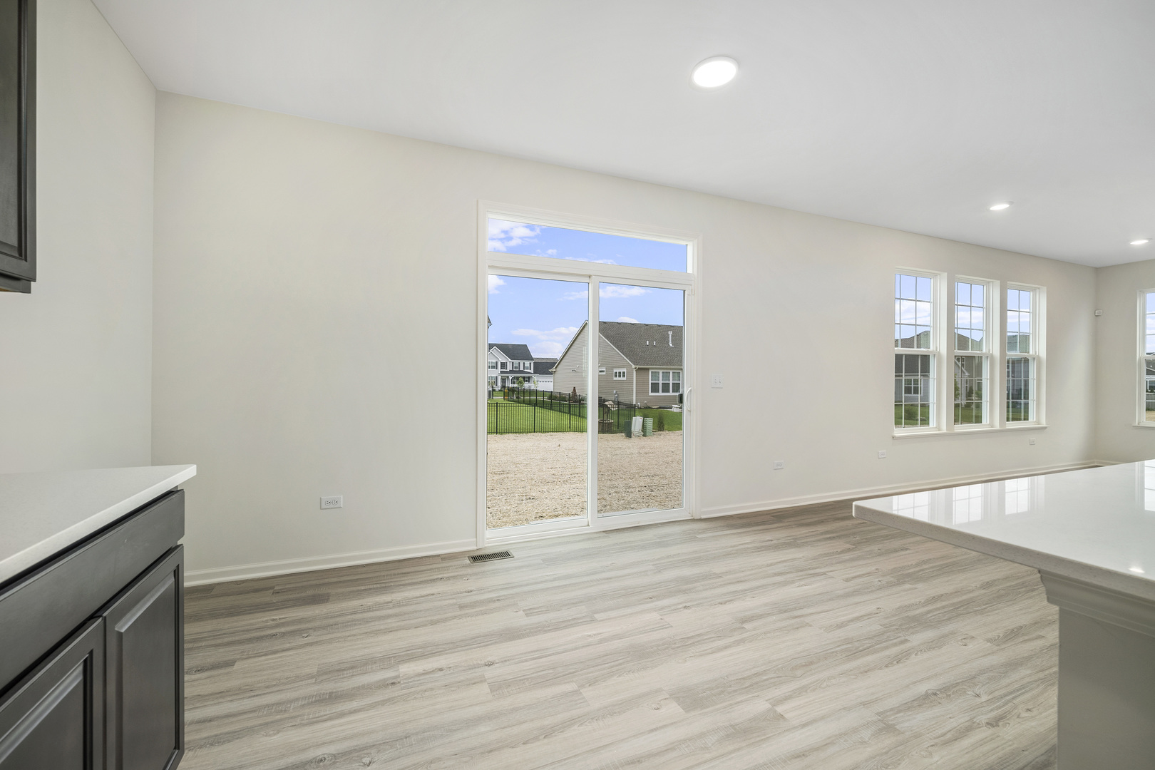 3668 Edelweiss Road Elgin, IL 60124 - Photo 15 of 23 a view of an empty room with wooden floor and a window