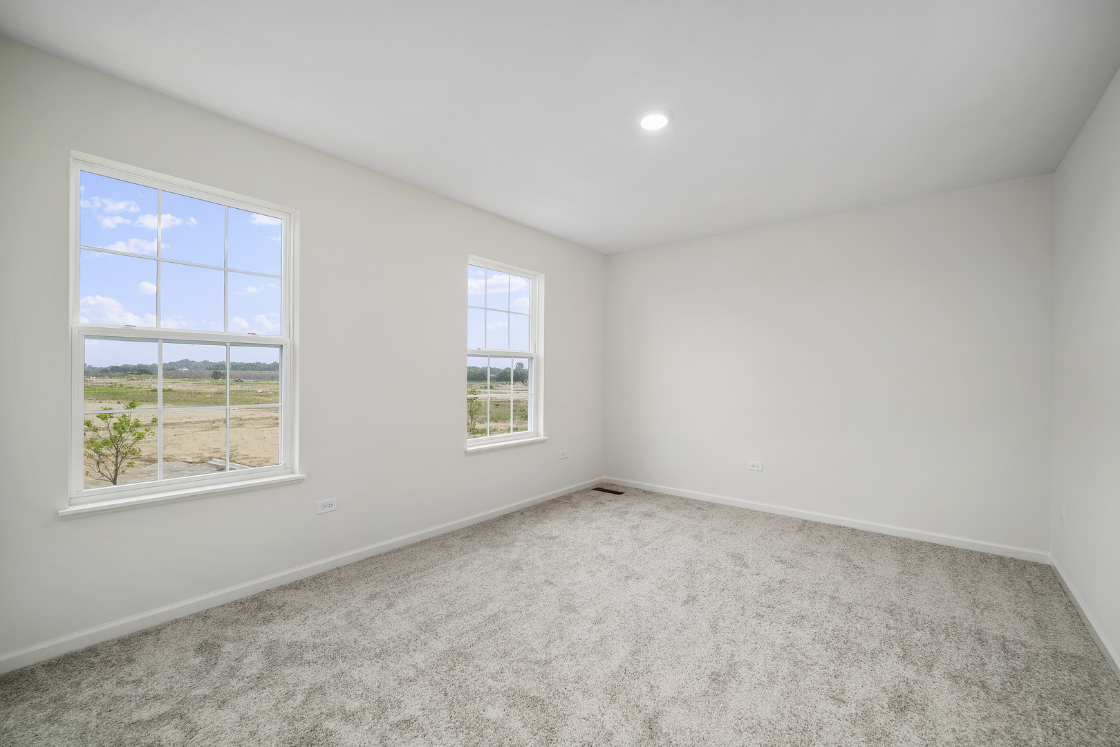 3668 Edelweiss Road Elgin, IL 60124 - Photo 18 of 23 an empty room with windows