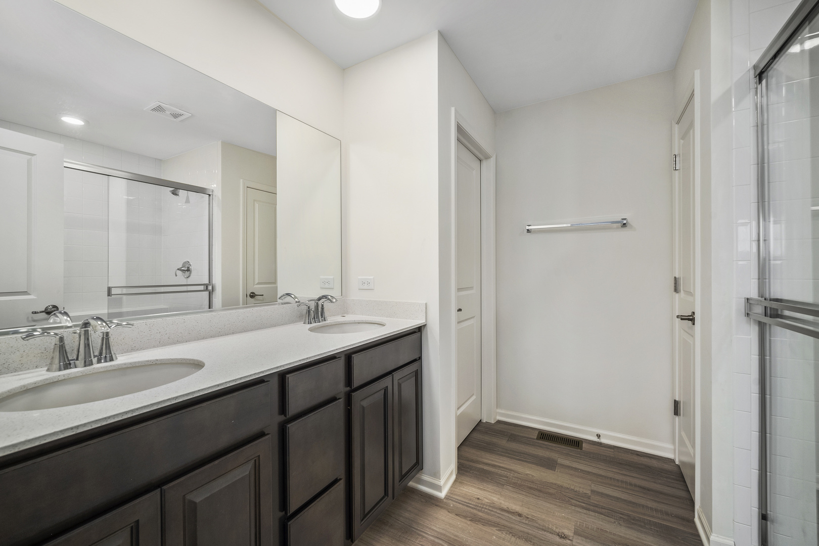 3668 Edelweiss Road Elgin, IL 60124 - Photo 23 of 23 a bathroom with a double vanity sink and mirror