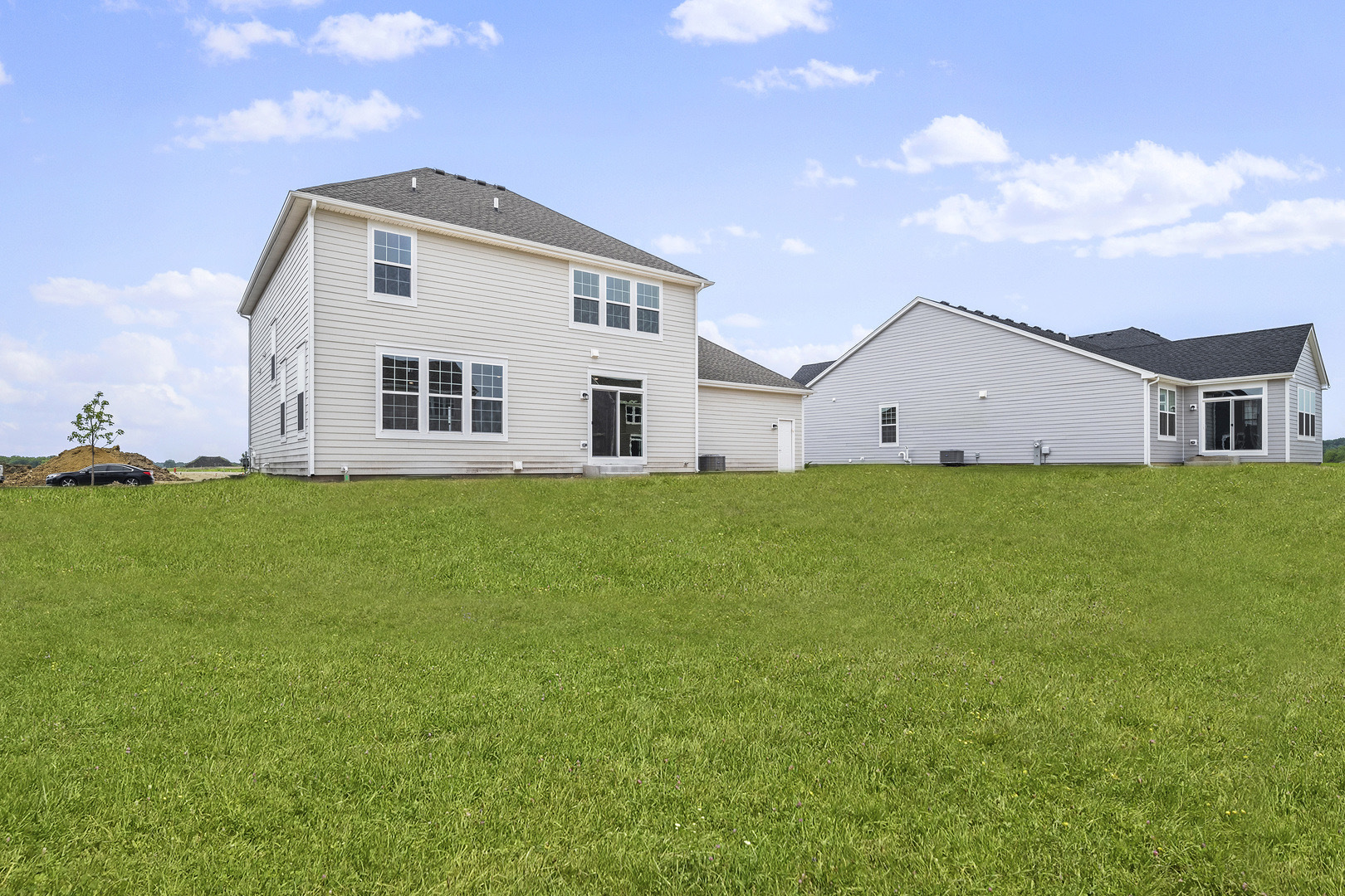 3668 Edelweiss Road Elgin, IL 60124 - Photo 3 of 23 a view of a house with a yard
