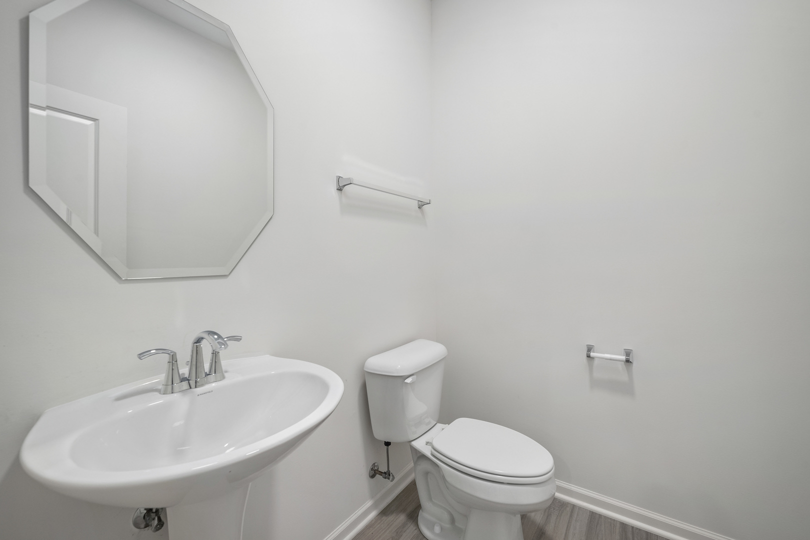 3668 Edelweiss Road Elgin, IL 60124 - Photo 5 of 23 a white toilet sitting next to a white sink