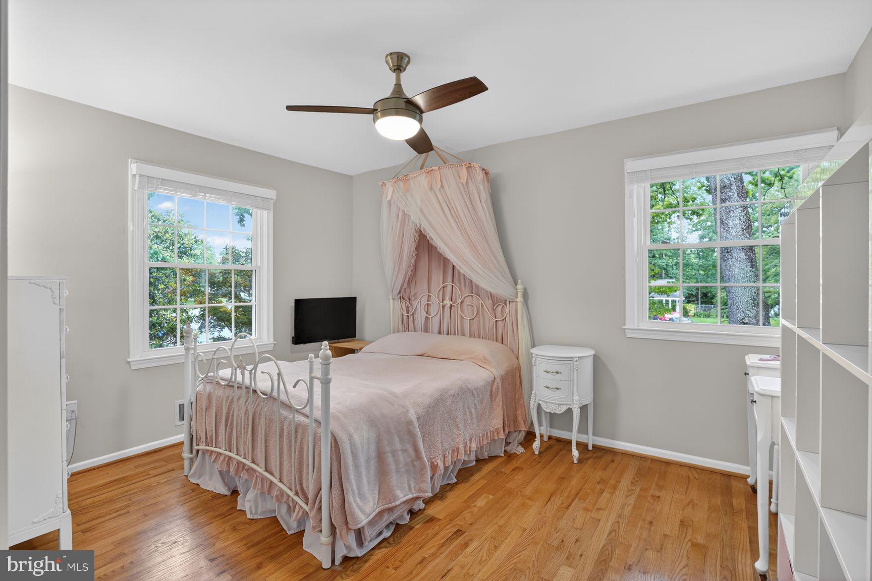 5024 Portsmouth Road Fairfax, VA 22032 - Photo 19 of 38 a bedroom with a bed and a window